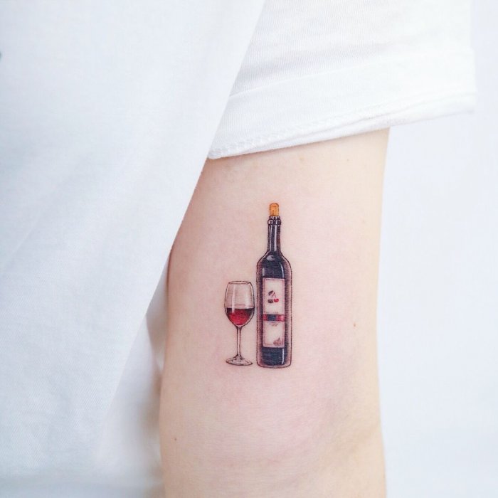 Wine tattoo on the shoulder for men