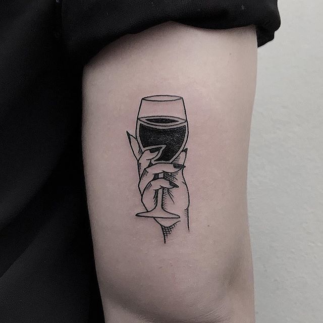 Wine tattoo on the shoulder for women