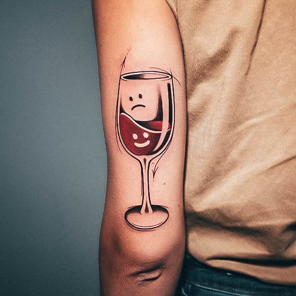 Large wine tattoo on the shoulder for men