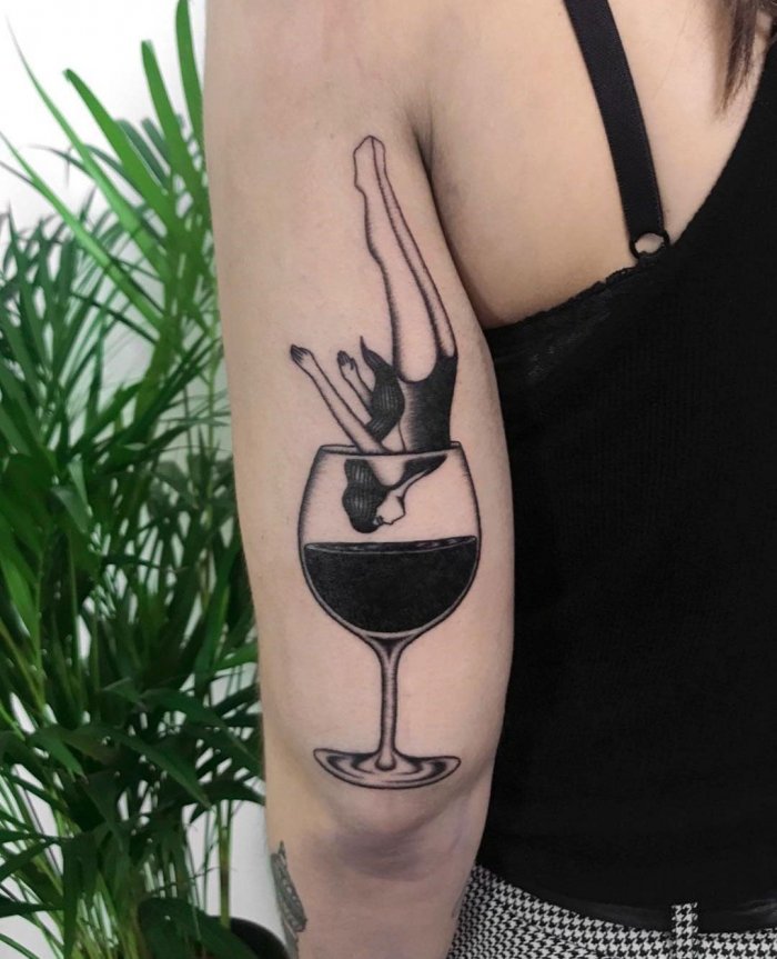 Wine tattoo on the shoulder for women