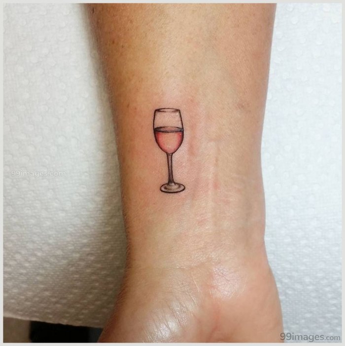 Wine tattoo on forearm for men