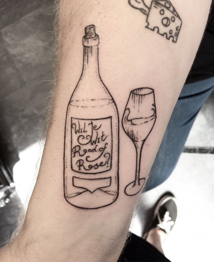 Wine tattoo on forearm for men