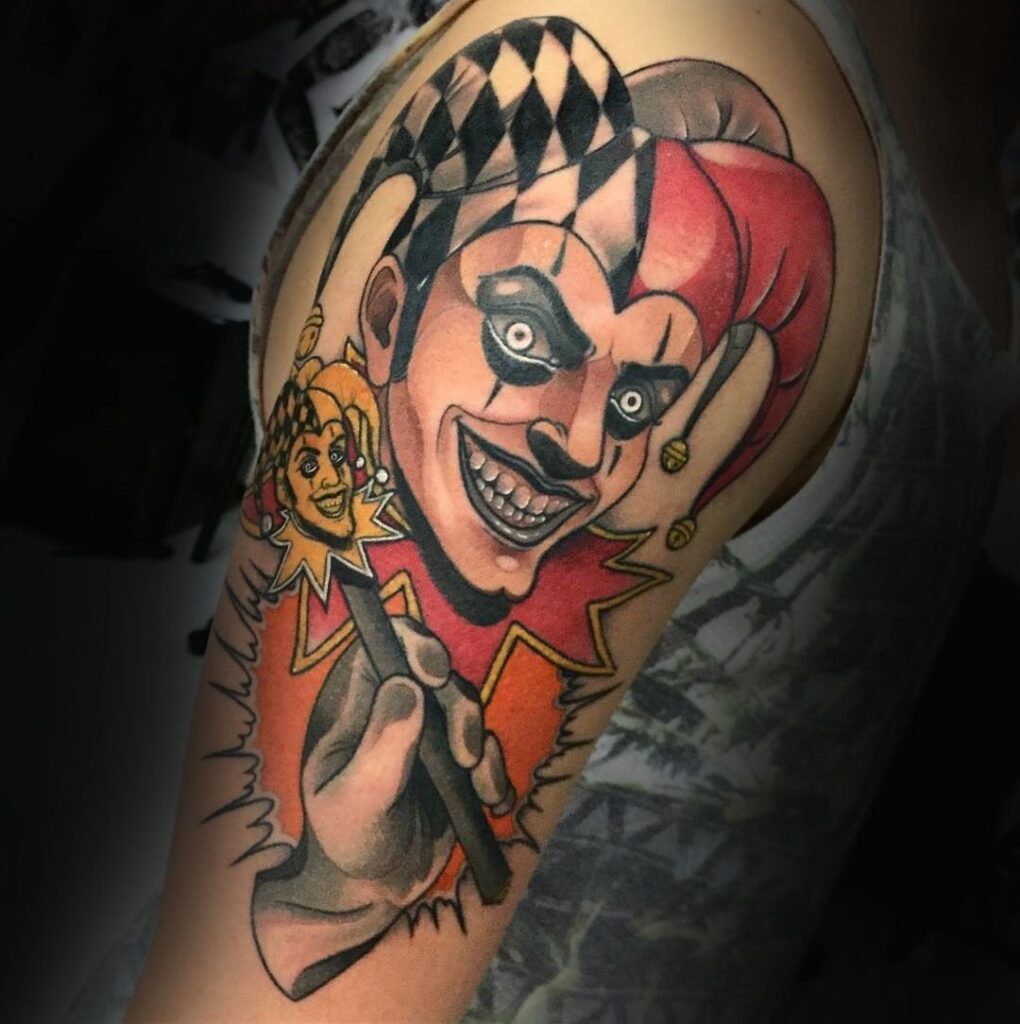 Harlequin tattoo on the shoulder for men