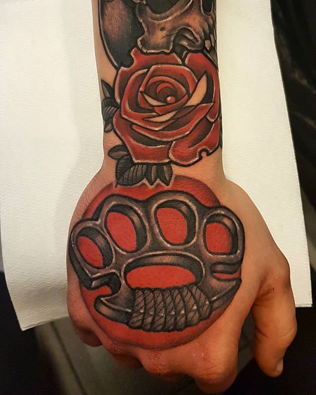 Knuckles tattoo on the hand for men