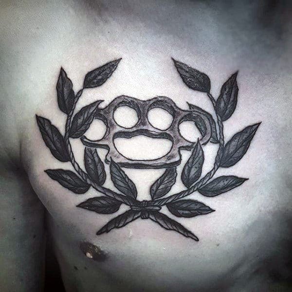 Knuckles tattoo on chest for men