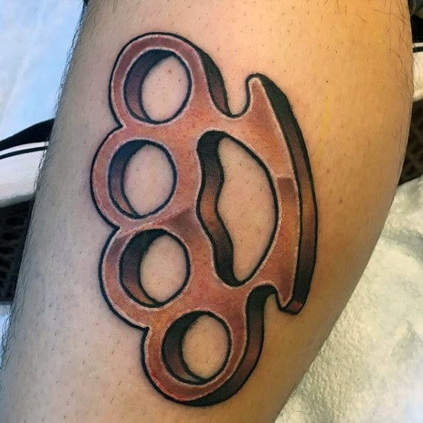 Knuckles tattoo on the arm for men