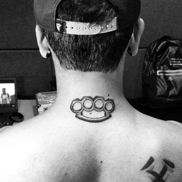 Knuckles tattoo on the back of the head for men