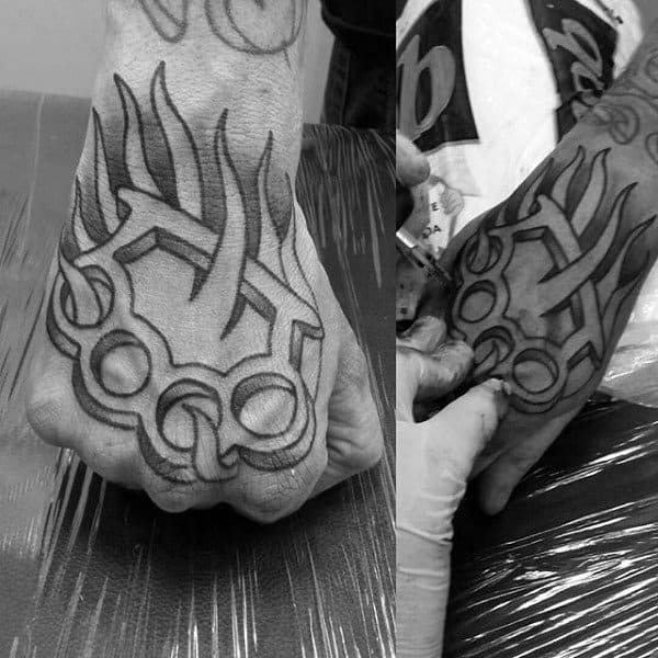 Knuckles tattoo on the hand for men