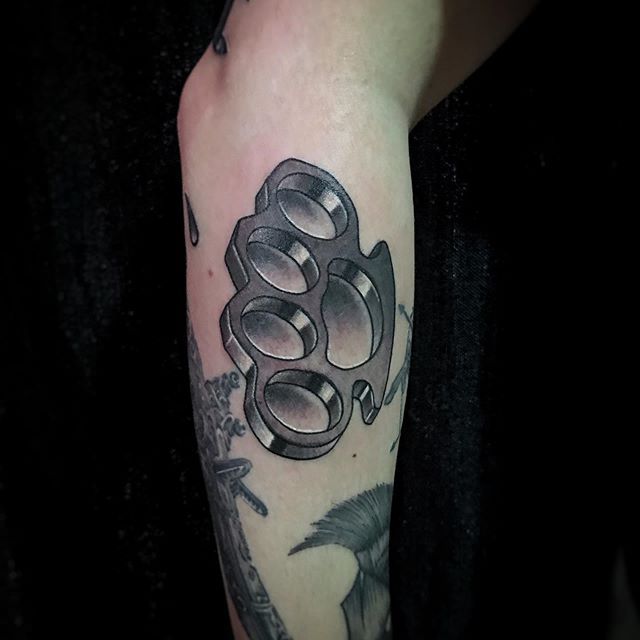 Knuckles tattoo on forearm for men