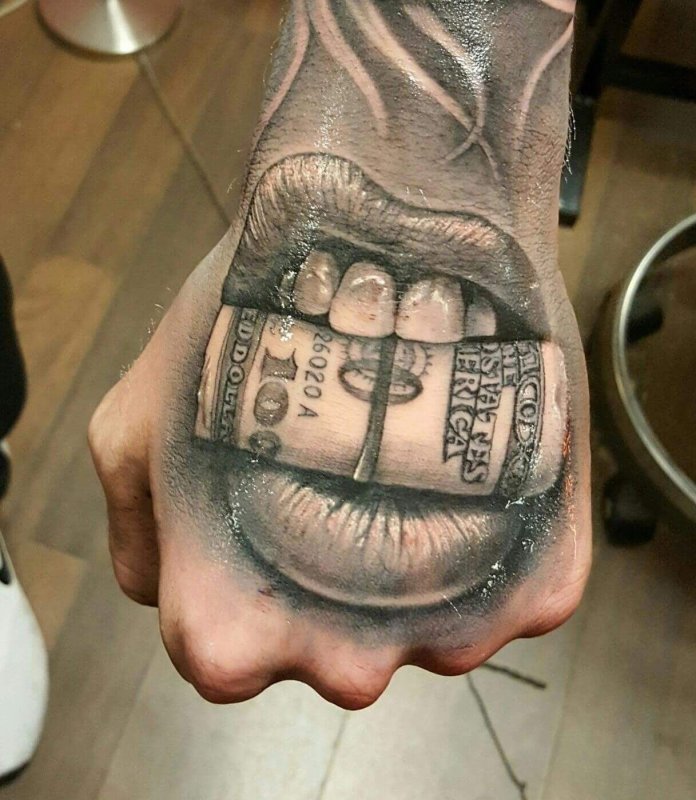 Money tattoo on the hand for men