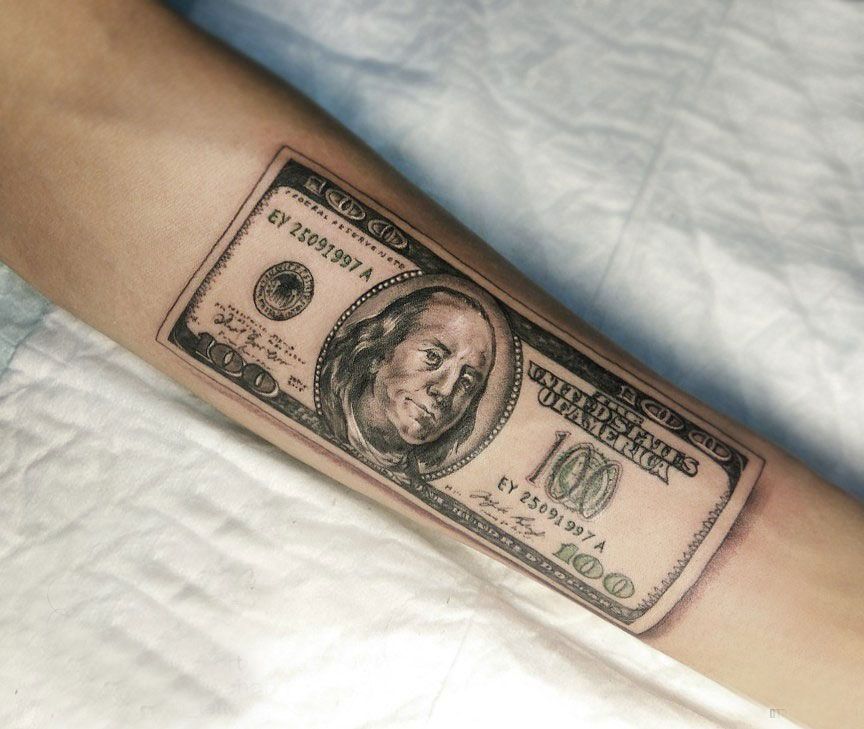 Money tattoo on forearm for men