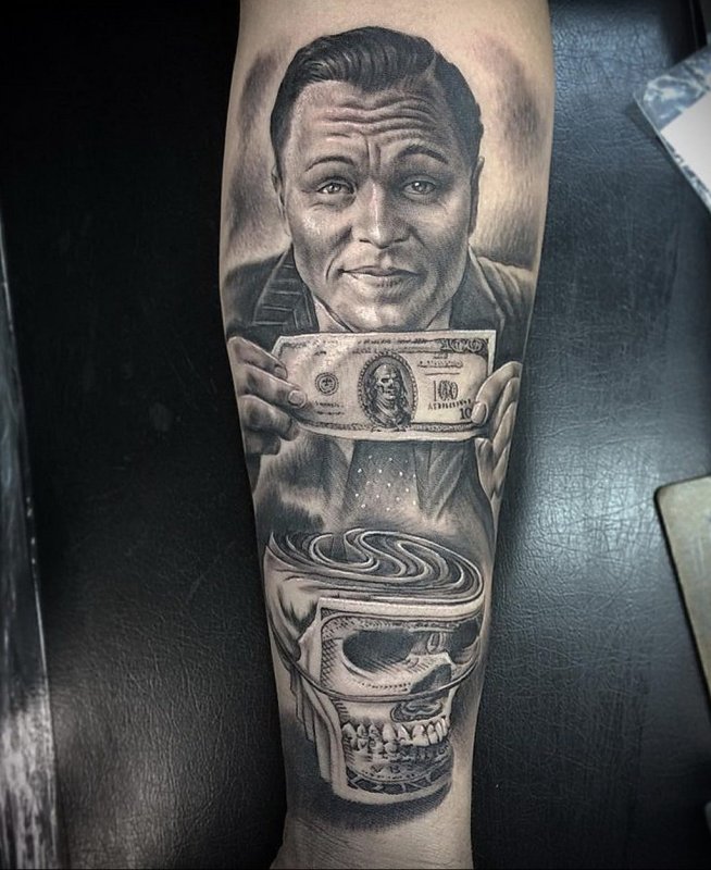 Money tattoo on forearm for men