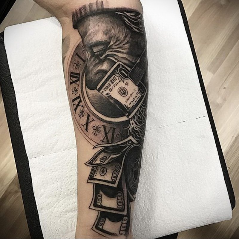 Money tattoo on arm for men