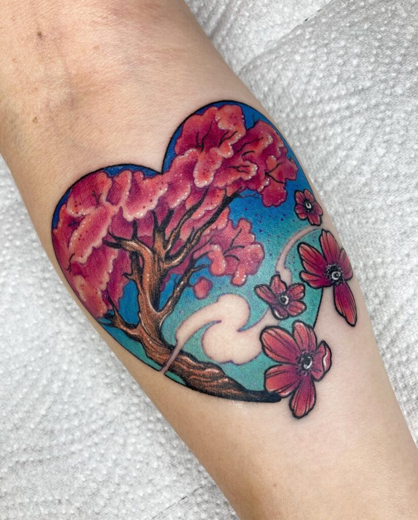 Sakura tattoo on forearm for women