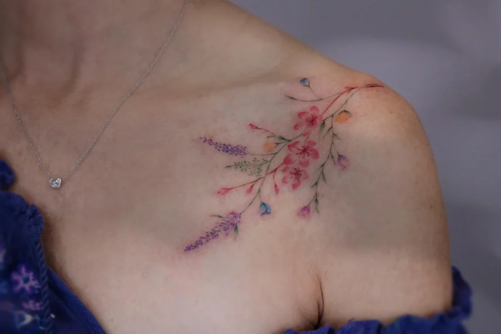 Sakura tattoo on collarbone for women