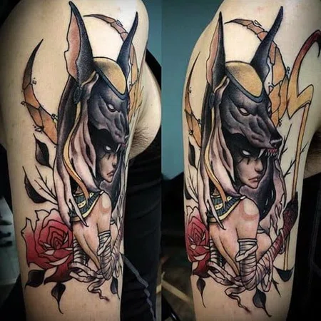 Anubis color tattoo on the shoulder for men