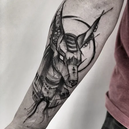 Anubis tattoo on forearm for men