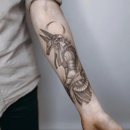 Anubis tattoo on forearm for men