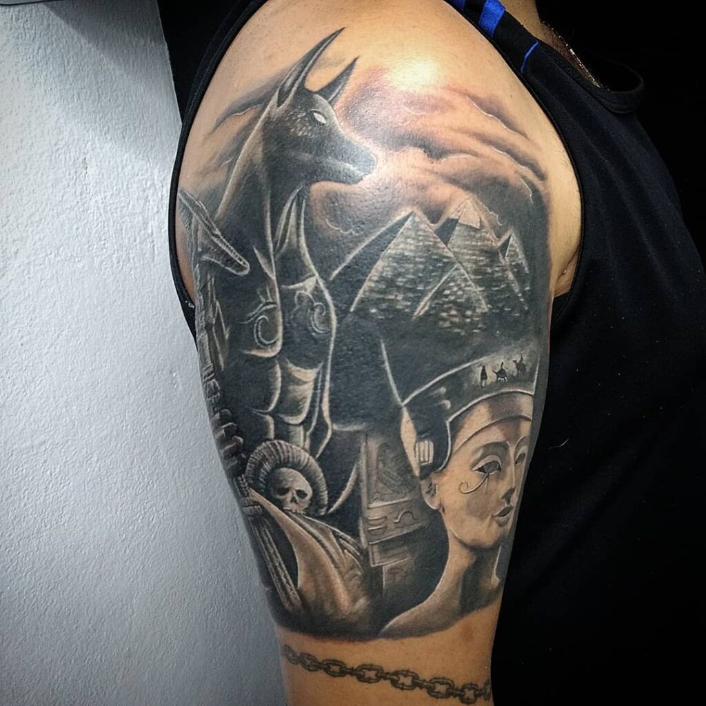 Anubis tattoo on the shoulder for men