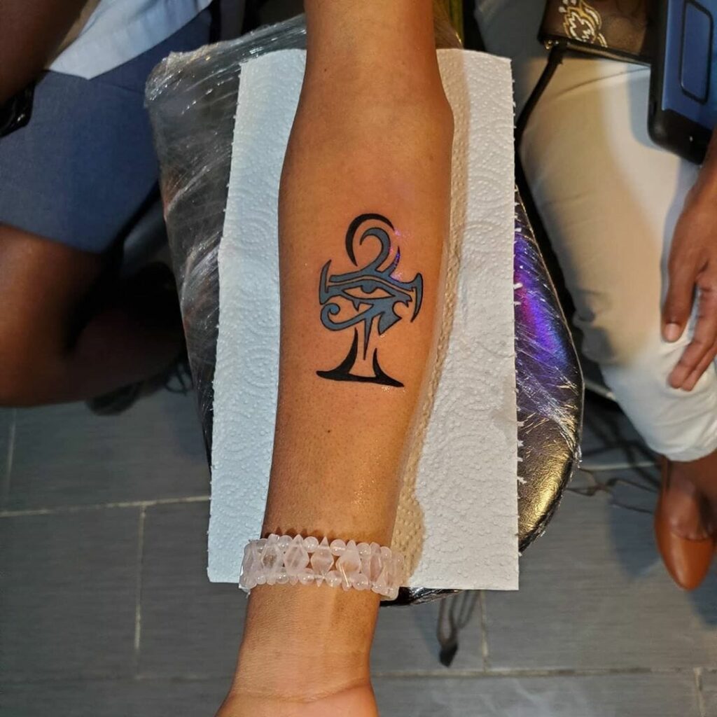 Ankh tattoo on forearm for men