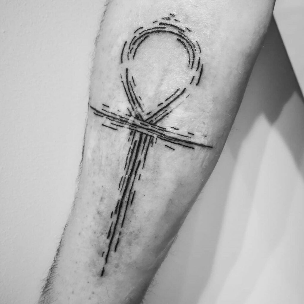 Ankh tattoo on the arm for men