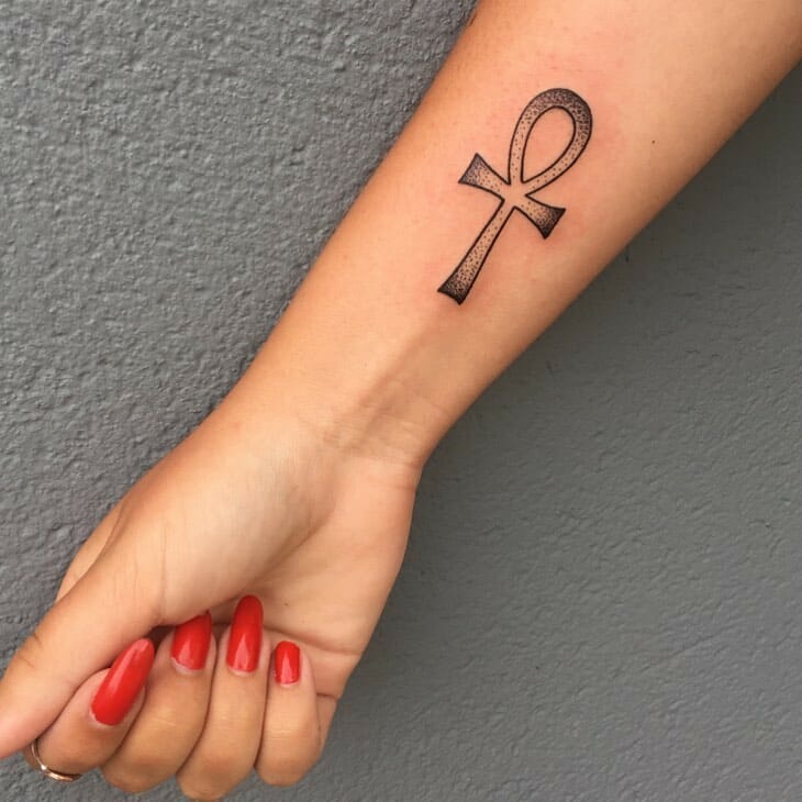 Ankh tattoo on forearm for women