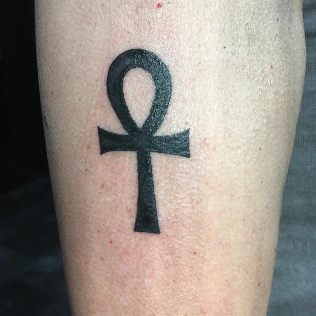 Ankh tattoo on the leg for men