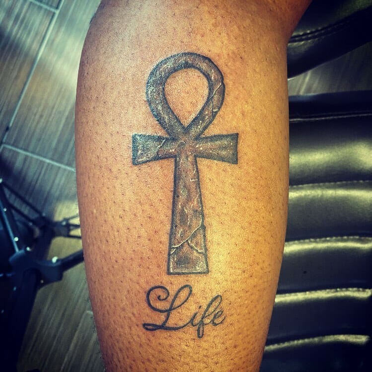 Ankh tattoo on the leg for men