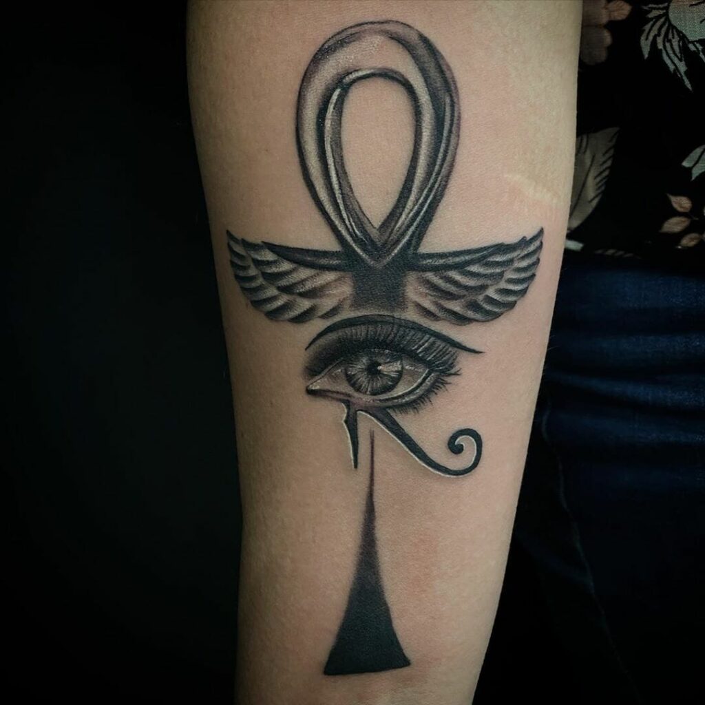 Ankh tattoo on forearm for women