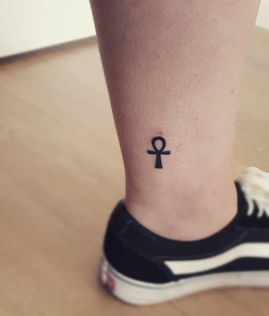 Ankh tattoo on the leg for men