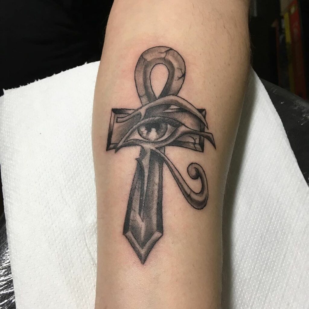 Ankh tattoo on the arm for men