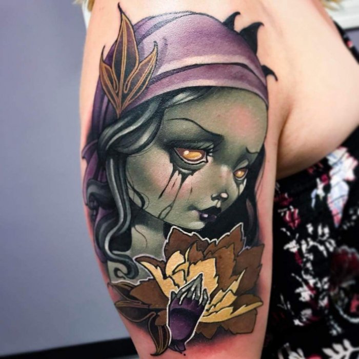 New-school style tattoo on the shoulder for women