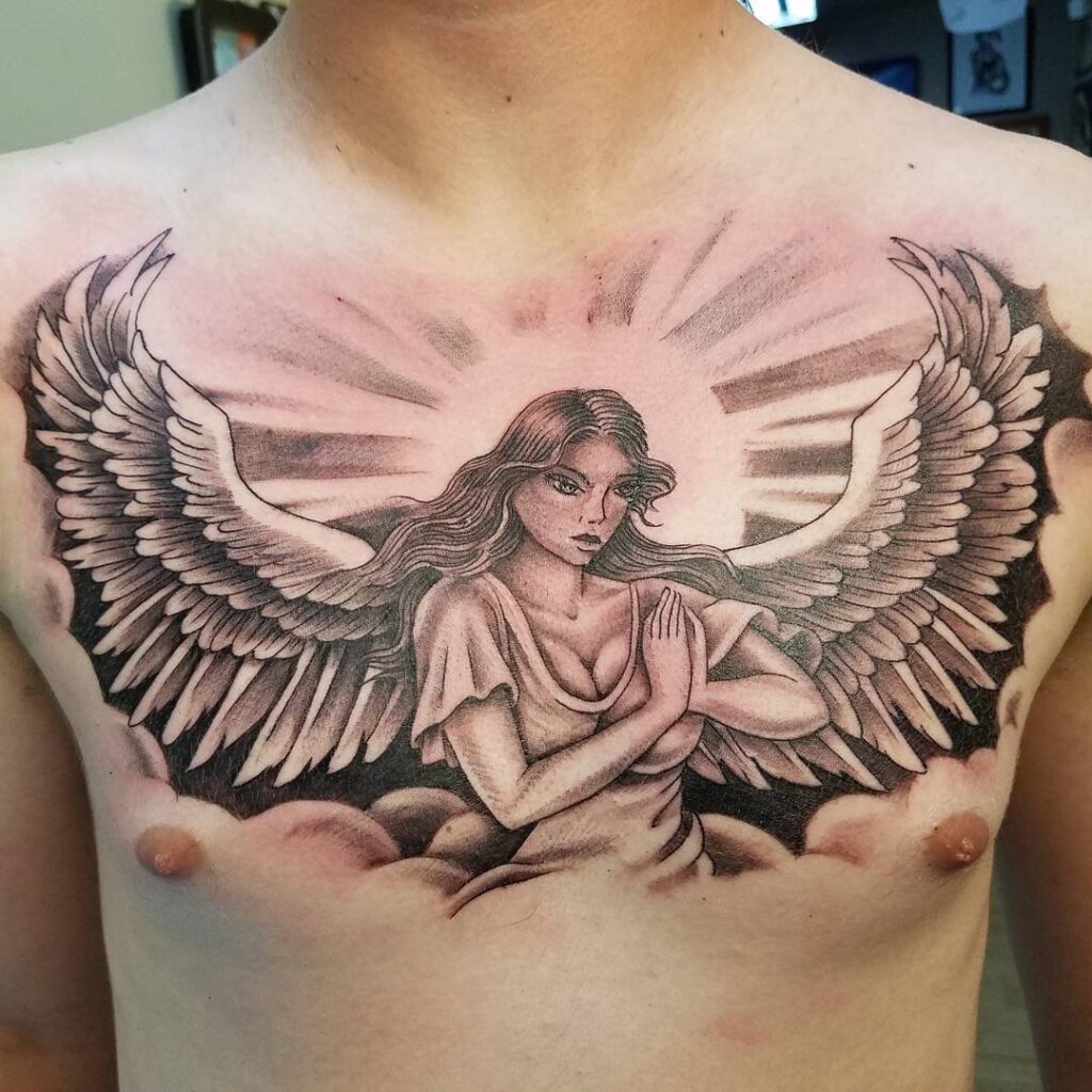 Angel tattoo on chest for men