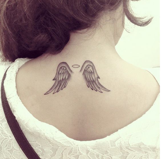 Angel tattoo on back for women