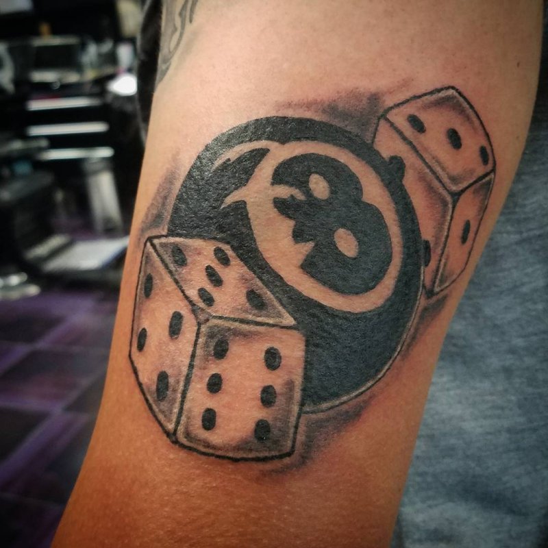 Dice tattoo on the shoulder for men