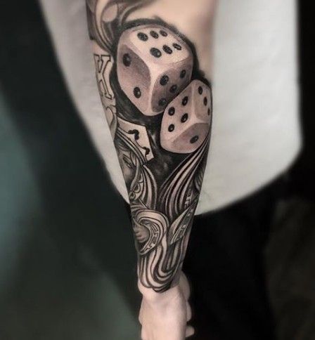 Dice tattoo on forearm for men