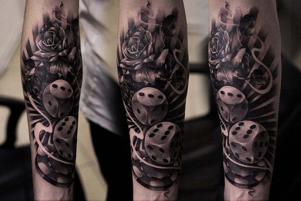 Dice tattoo on forearm for men