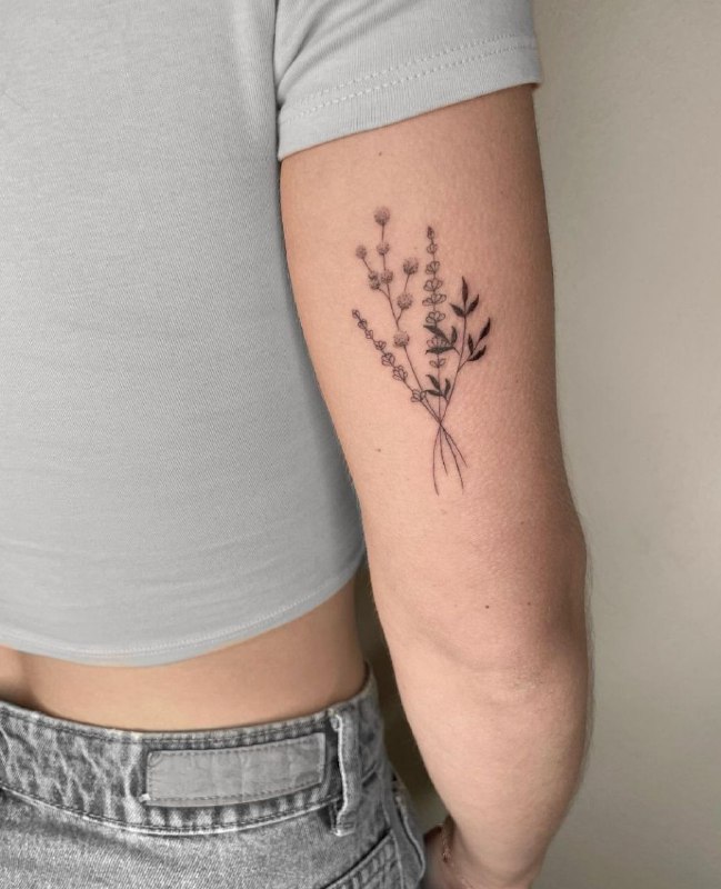 Minimalist tattoo on the shoulder for women