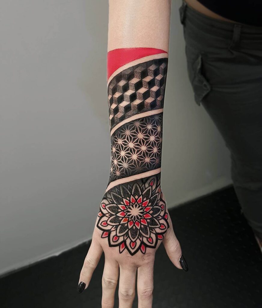 Ornamental style tattoo on the arm for women