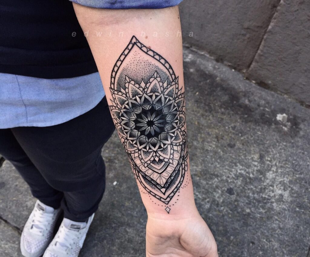 Ornamental style tattoo on the forearm for women