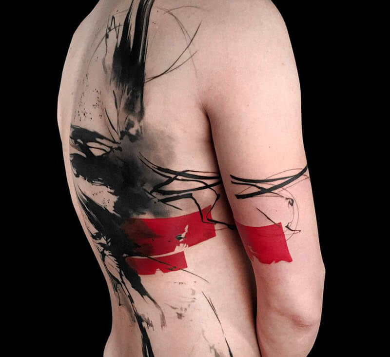 Thrash polka style tattoo on the back for men