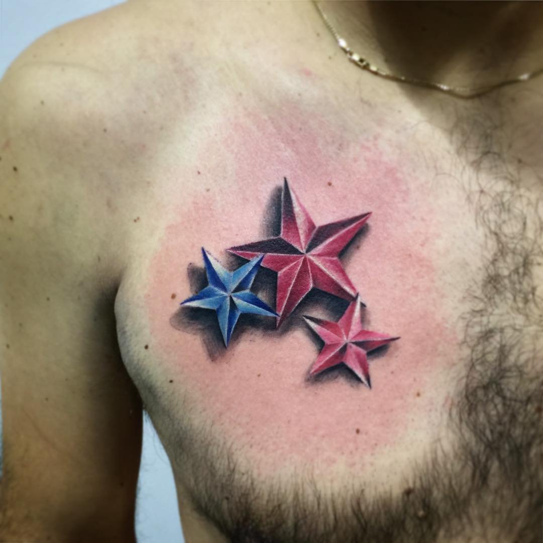 Three stars tattoo on chest for men