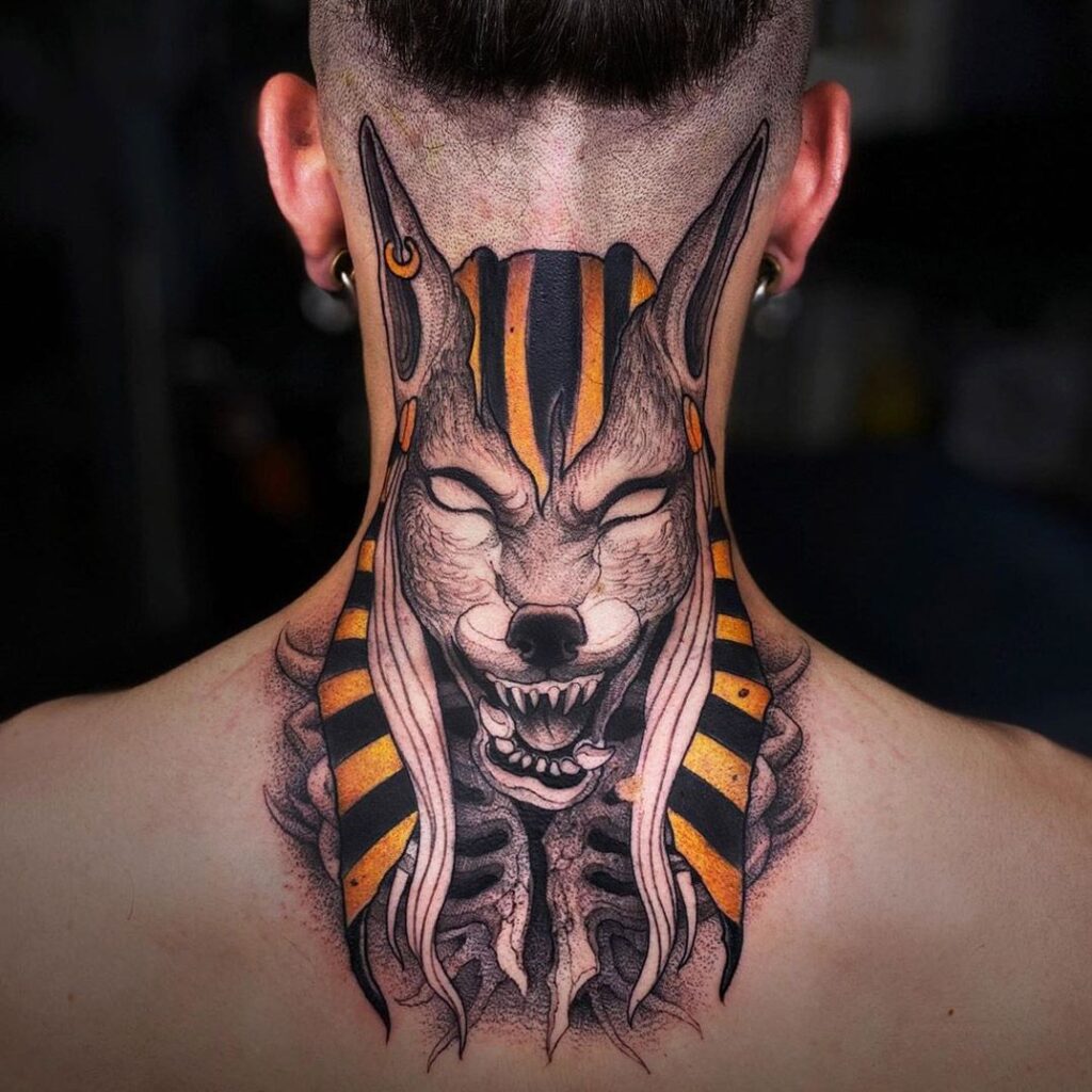 Anubis tattoo on the back of the head for men