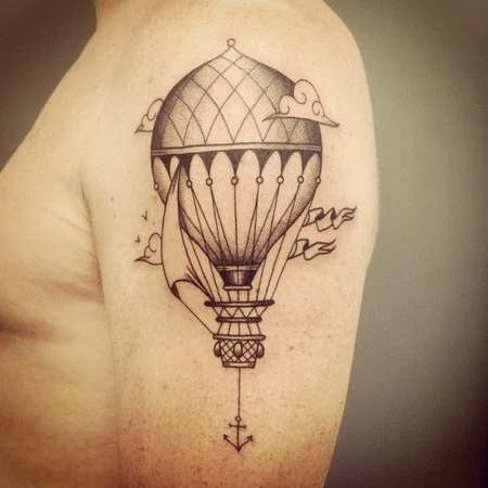 Balloon tattoo on the shoulder for men