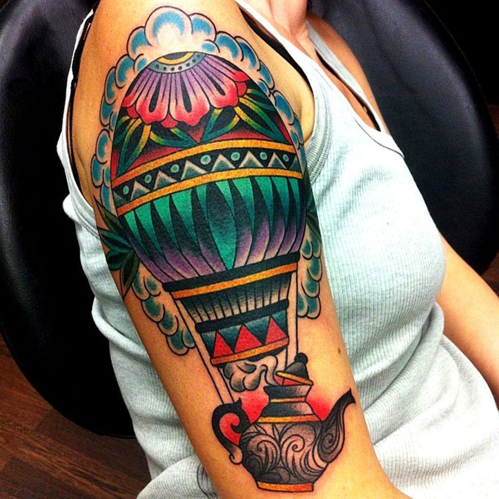 Balloon tattoo on shoulder for women