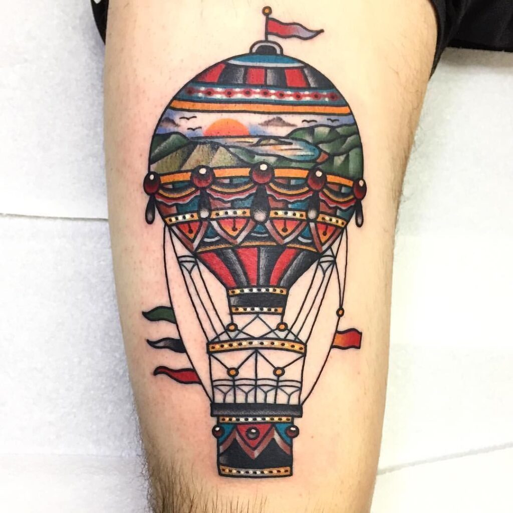 Balloon tattoo on thigh for men