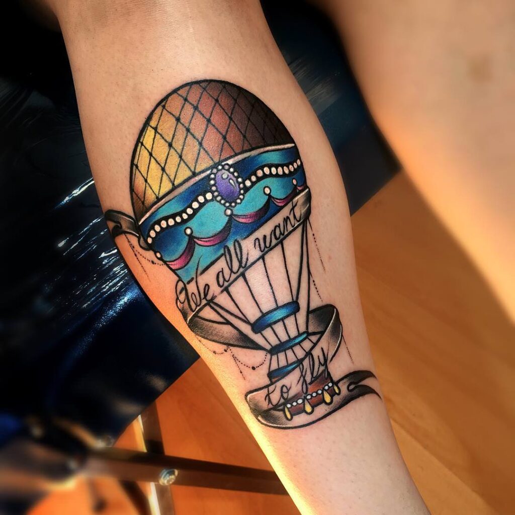 Balloon tattoo on calf for men