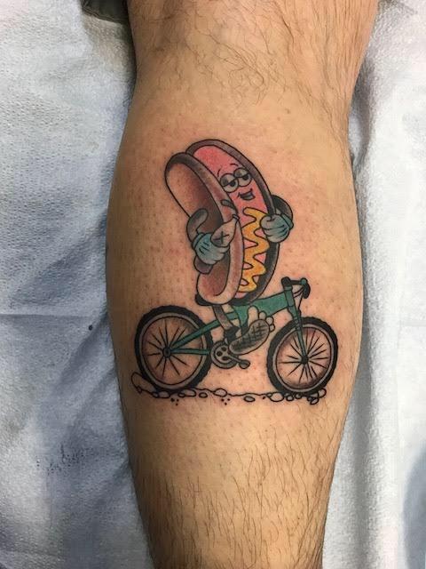 Bicycle tattoo on shin for men