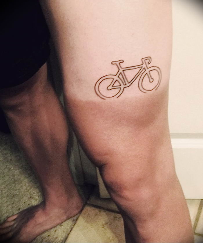 Bicycle tattoo on thigh for men