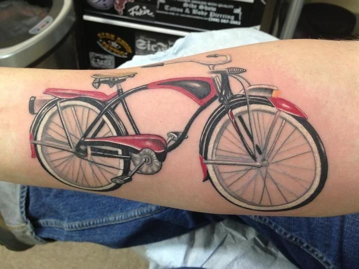 Bicycle tattoo on arm for men